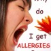 Woman With An Allergy Smelling A Flower