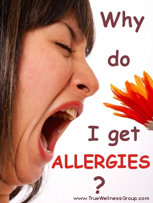 Woman With An Allergy Smelling A Flower
